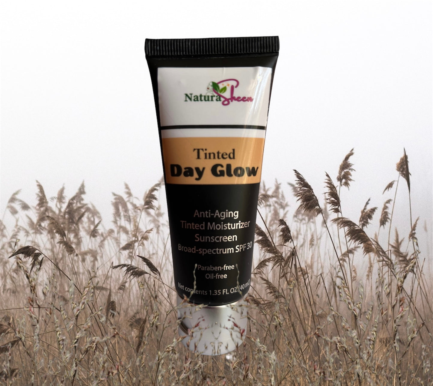 DAY GLOW ANTI-AGING TINTED MOISTURIZER. BROAD SPECTRUM SPF 30. VEGAN. PARABEN-FREE. OIL-FREE.  40ml